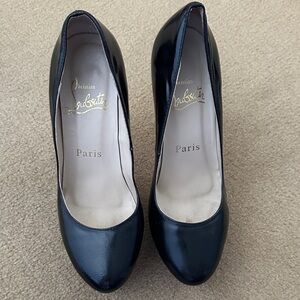 Christian Louboutin Black Patent Round-Toe Pumps with Subtle Shine